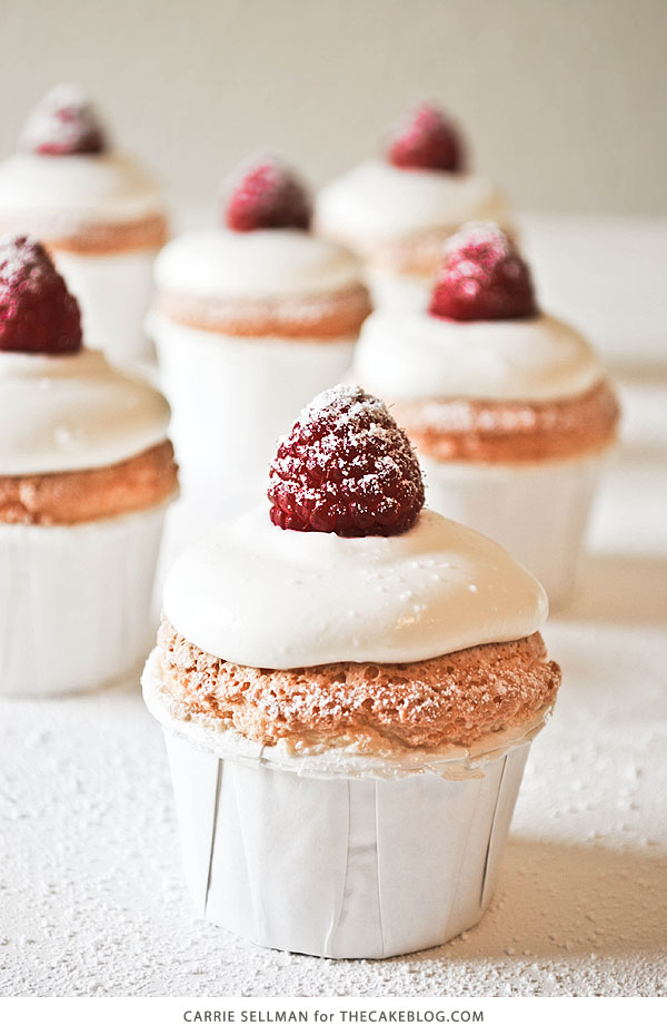 Angel Food Cupcakes with sweetened cream and raspberries | by Carrie Sellman for TheCakeBlog.com