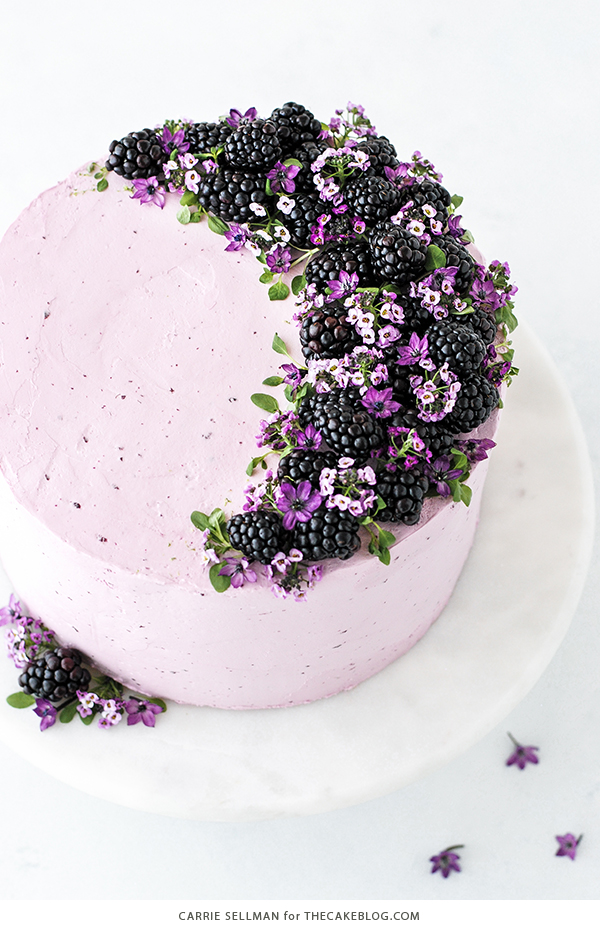 Blackberry Lime Cake - tender cake infused with lime zest, frosted with blackberry buttercream, topped with fresh blackberries and edible flowers | by Carrie Sellman for TheCakeBlog.com