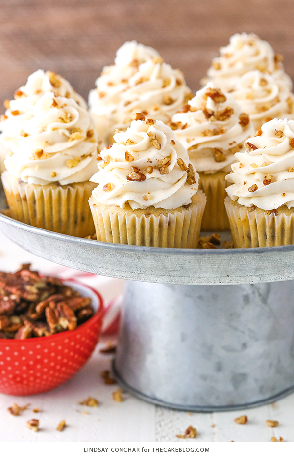 Butter Pecan Cupcakes - moist vanilla cupcakes studded with toasted butter pecans and topped with cinnamon buttercream frosting | by Lindsay Conchar for TheCakeBlog.com