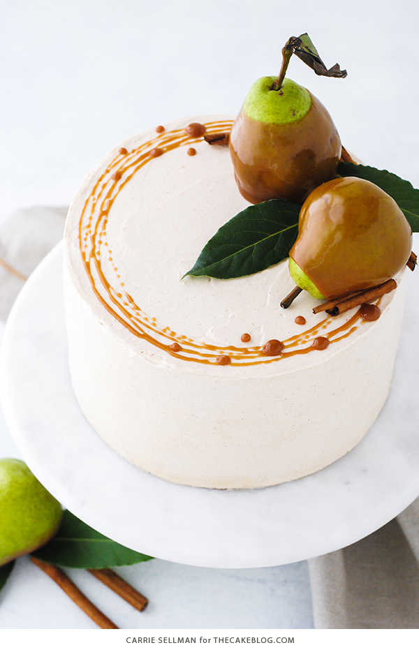 Salted Caramel Pear Cake - fresh pear cake with cinnamon buttercream, salted caramel and homemade caramel dipped pears | Carrie Sellman for TheCakeBlog.com