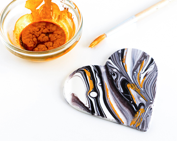 Marble Chocolate Hearts - how to make marbled heart toppers for cakes and cupcakes using chocolate coating and cookie cutters | by Erin Gardner for TheCakeBlog.com