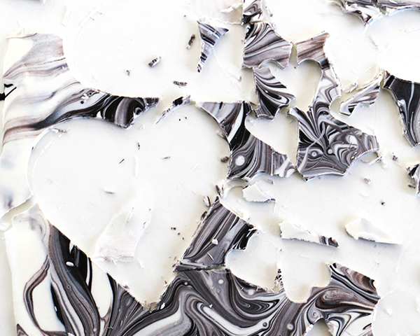 Marble Chocolate Hearts - how to make marbled heart toppers for cakes and cupcakes using chocolate coating and cookie cutters | by Erin Gardner for TheCakeBlog.com