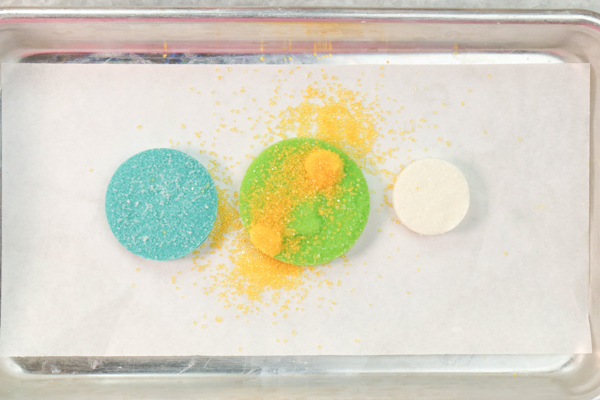 Sprinkle Ornament Cake – how to make sparkling ornaments for cakes and cupcakes using chocolate, cookie cutters and sprinkles | by Erin Gardner for TheCakeBlog.com