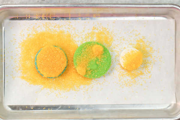 Sprinkle Ornament Cake – how to make sparkling ornaments for cakes and cupcakes using chocolate, cookie cutters and sprinkles | by Erin Gardner for TheCakeBlog.com