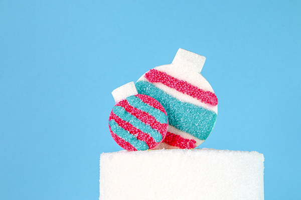 Sprinkle Ornament Cake – how to make sparkling ornaments for cakes and cupcakes using chocolate, cookie cutters and sprinkles | by Erin Gardner for TheCakeBlog.com