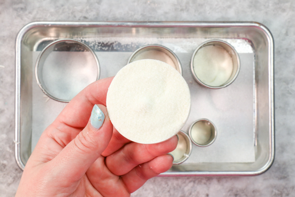 Sprinkle Ornament Cake – how to make sparkling ornaments for cakes and cupcakes using chocolate, cookie cutters and sprinkles | by Erin Gardner for TheCakeBlog.com