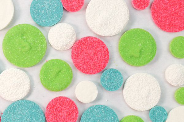 Sprinkle Ornament Cake – how to make sparkling ornaments for cakes and cupcakes using chocolate, cookie cutters and sprinkles | by Erin Gardner for TheCakeBlog.com