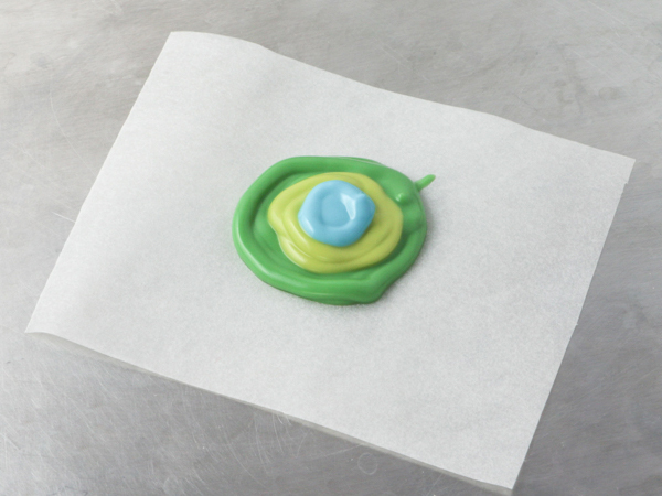 Mod Polka Dot Cake - how to make colorful polka dot toppers for cakes and cupcakes using chocolate coating | Erin Gardner for TheCakeBlog.com