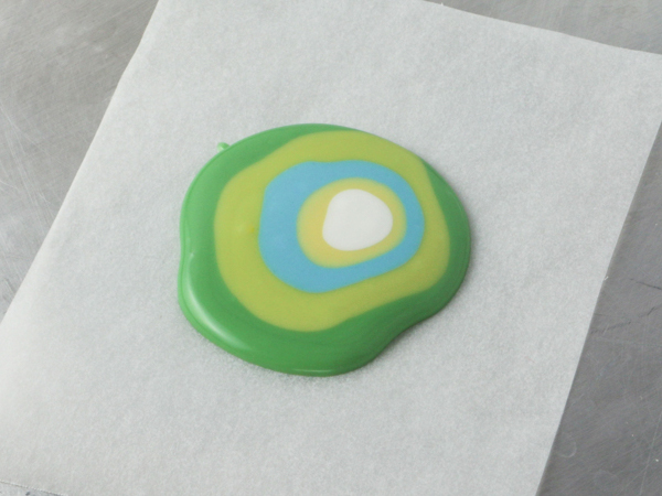 Mod Polka Dot Cake - how to make colorful polka dot toppers for cakes and cupcakes using chocolate coating | Erin Gardner for TheCakeBlog.com