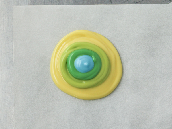 Mod Polka Dot Cake - how to make colorful polka dot toppers for cakes and cupcakes using chocolate coating | Erin Gardner for TheCakeBlog.com