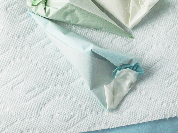 Mod Polka Dot Cake - how to make colorful polka dot toppers for cakes and cupcakes using chocolate coating | Erin Gardner for TheCakeBlog.com