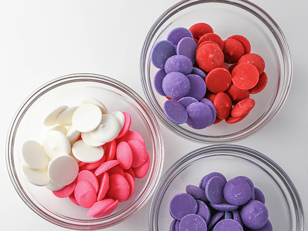 Mod Polka Dot Cake - how to make colorful polka dot toppers for cakes and cupcakes using chocolate coating | Erin Gardner for TheCakeBlog.com