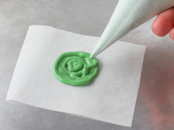 Mod Polka Dot Cake - how to make colorful polka dot toppers for cakes and cupcakes using chocolate coating | Erin Gardner for TheCakeBlog.com