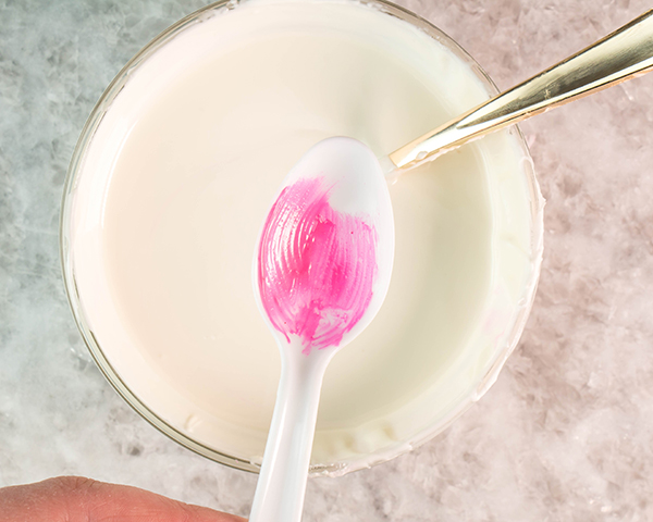 Chocolate Tulips - how to make gorgeous tulip cake decorations using melted chocolate and a plastic spoon | by Erin Gardner for TheCakeBlog.com