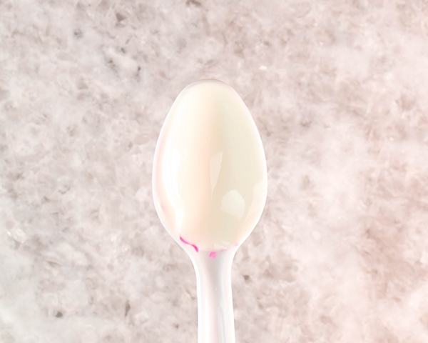 Chocolate Tulips - how to make gorgeous tulip cake decorations using melted chocolate and a plastic spoon | by Erin Gardner for TheCakeBlog.com