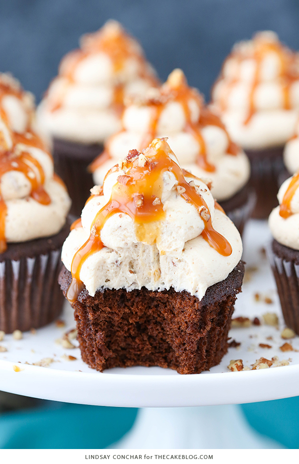 Chocolate Turtle Cupcakes - from scratch recipe for rich chocolate cupcakes with caramel pecan frosting, caramel drizzle and chopped pecans | by Lindsay Conchar for TheCakeBlog.com