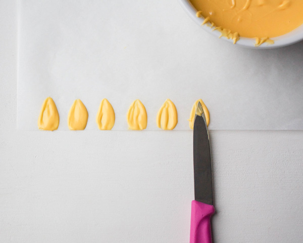 Chocolate Daffodils - how to make a chocolate flower cake, featuring chocolate daffodils | by Erin Gardner for TheCakeBlog.com