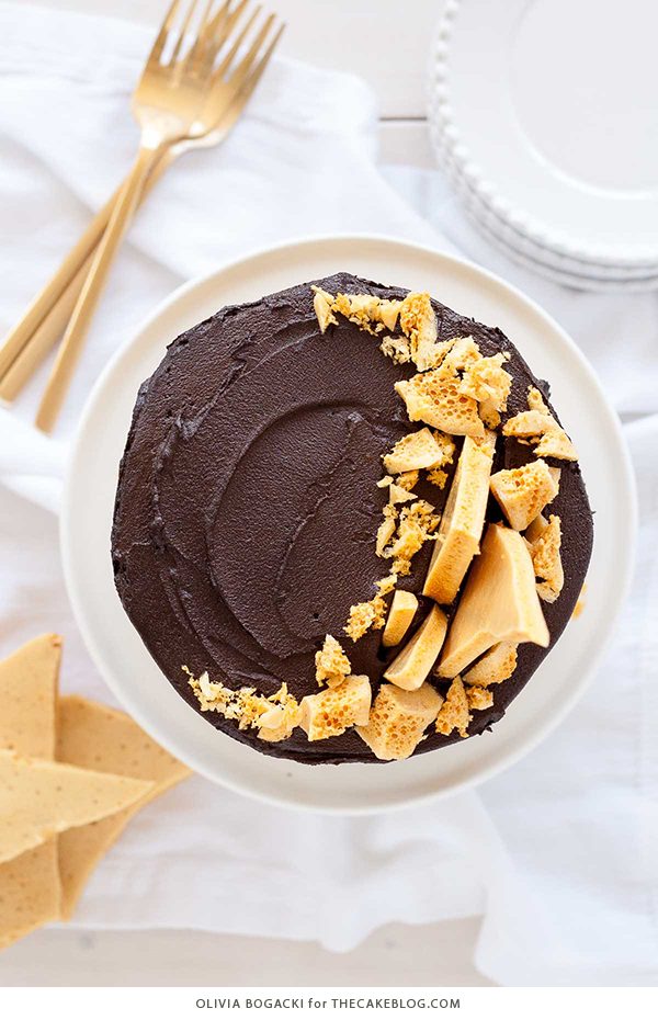 Dark Chocolate Honeycomb Cake - a rich chocolate layer cake recipe with ultra dark, fudgy frosting and homemade honeycomb | by Olivia Bogacki for TheCakeBlog.com
