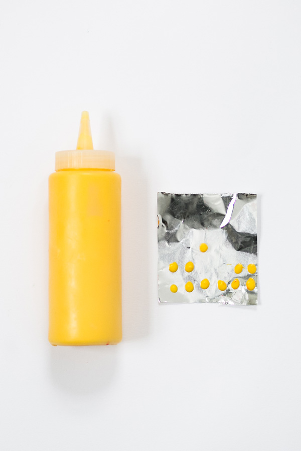 Chocolate Poinsettias - learn how to make these chocolate flowers with candy melts and a knife | Erin Gardner for TheCakeBlog.com