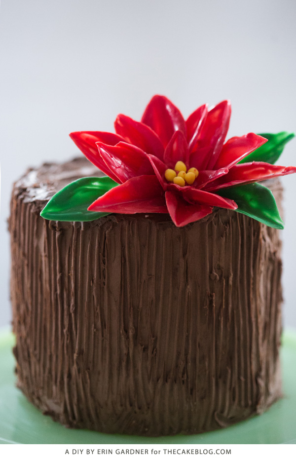Chocolate Poinsettias - learn how to make these chocolate flowers with candy melts and a knife | Erin Gardner for TheCakeBlog.com
