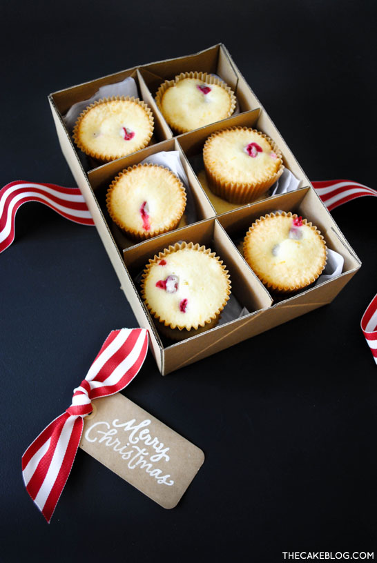 Cranberry Orange Cupcakes with sugared cranberries. Perfect for the holidays and Christmas dessert | Carrie Sellman for TheCakeBlog.com