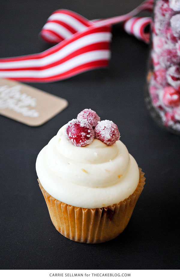 Cranberry Orange Cupcakes with sugared cranberries | by Carrie Sellman for TheCakeBlog.com