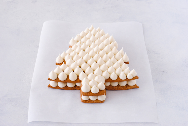 Cream Tart Tree Cake - gingerbread cookie with cream cheese frosting and festive holiday toppings | by Carrie Sellman for TheCakeBlog.com
