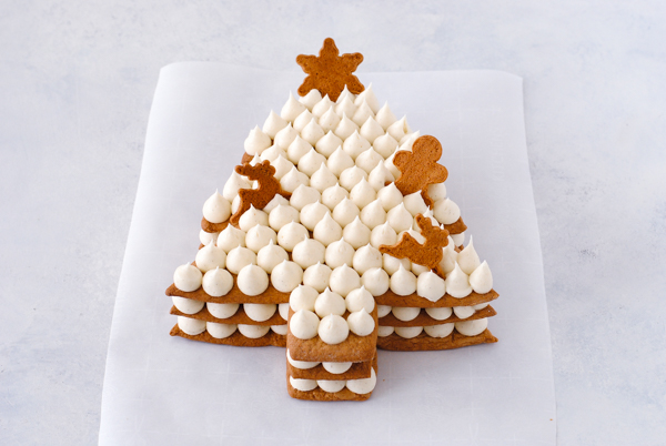 Cream Tart Tree Cake - gingerbread cookie with cream cheese frosting and festive holiday toppings | by Carrie Sellman for TheCakeBlog.com