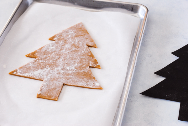 Cream Tart Tree Cake - gingerbread cookie with cream cheese frosting and festive holiday toppings | by Carrie Sellman for TheCakeBlog.com