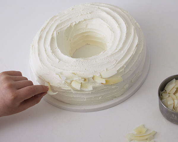 Easter Nest Cake - how to make a nest cake with roasted coconut and chocolate eggs for Easter dessert | by Cakegirls for TheCakeBlog.com