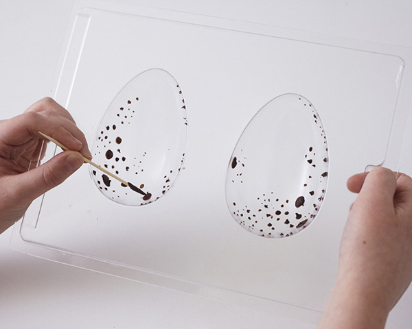 Easter Nest Cake - how to make a nest cake with roasted coconut and chocolate eggs for Easter dessert | by Cakegirls for TheCakeBlog.com