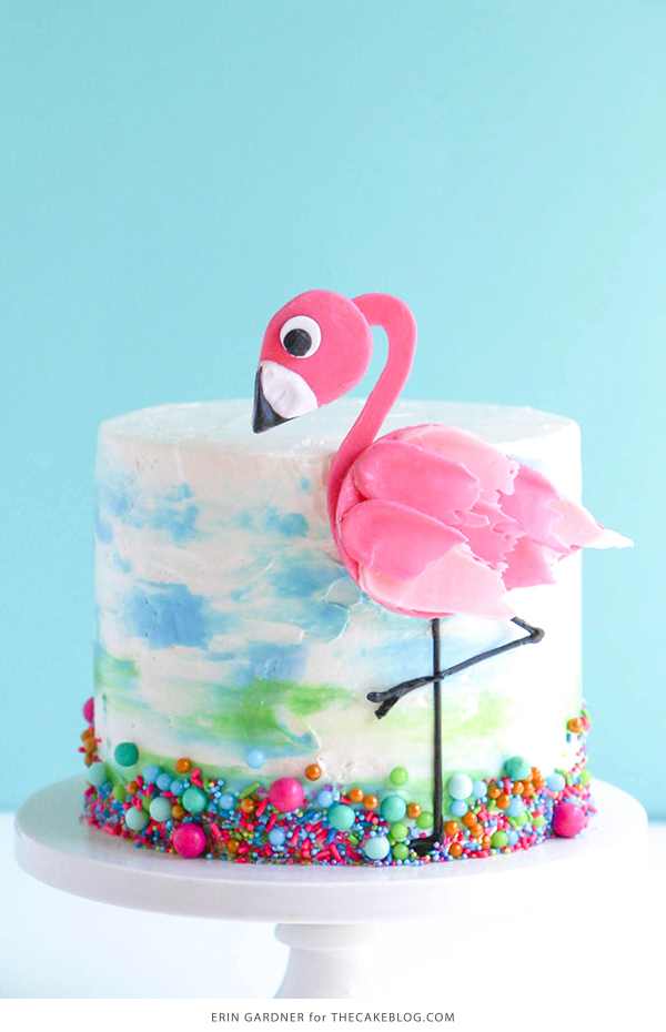 Flamingo Cake - how to make a pink flamingo cake topper using chocolate candy melts and brushstroke feathers | by Erin Gardner for TheCakeBlog.com