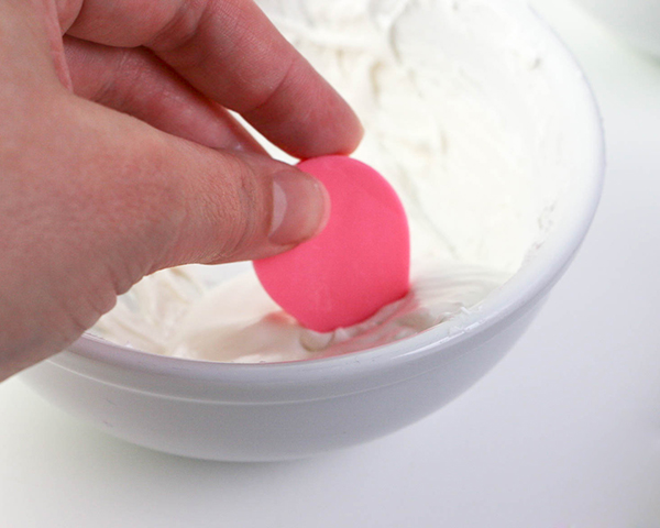 Flamingo Cake - how to make a pink flamingo cake topper using chocolate candy melts and brushstroke feathers | by Erin Gardner for TheCakeBlog.com