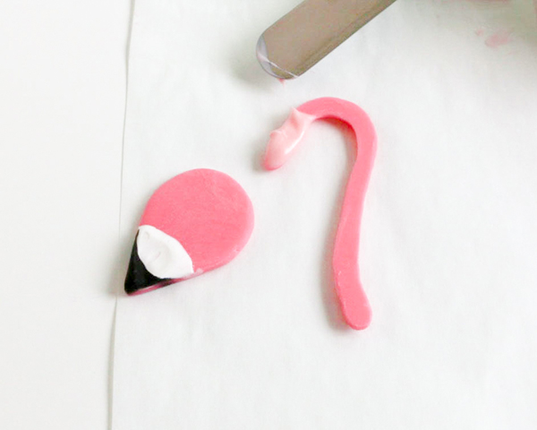 Flamingo Cake - how to make a pink flamingo cake topper using chocolate candy melts and brushstroke feathers | by Erin Gardner for TheCakeBlog.com
