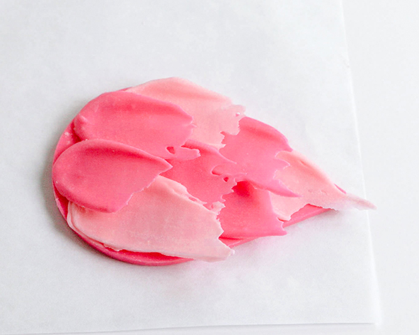 Flamingo Cake - how to make a pink flamingo cake topper using chocolate candy melts and brushstroke feathers | by Erin Gardner for TheCakeBlog.com