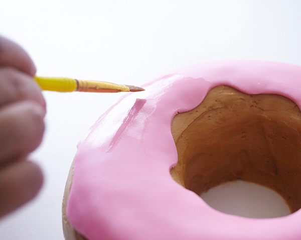 Giant Donut Cake! Learn how to make this adorable, sprinkle-coated, giant donut cake with a simple step-by-step tutorial | by Cakegirls for TheCakeBlog.com