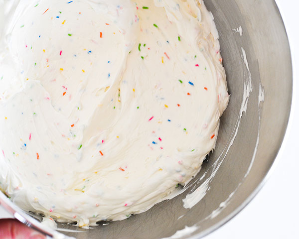 Graduation Party Desserts including this DIY sprinkle cake with easy edible writing | by Carrie Sellman for TheCakeBlog.com