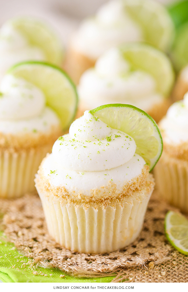 Key Lime Cupcakes - light, fluffy cupcakes full of key lime flavor! With lime juice and zest, topped with a tangy sweet lime frosting and graham cracker crumbs | by Lindsay Conchar for TheCakeBlog.com
