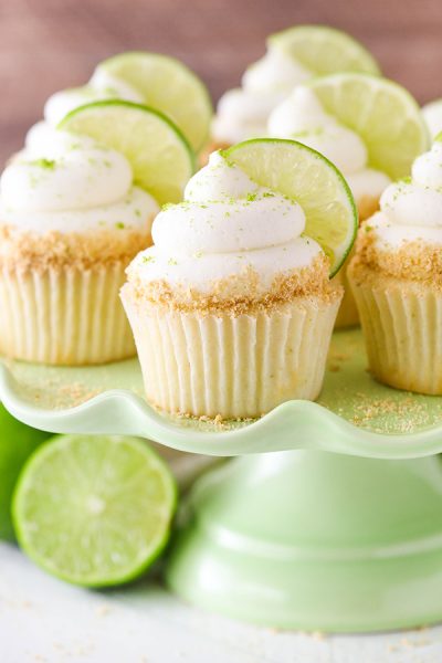 Key Lime Cupcakes - light, fluffy cupcakes full of key lime flavor! With lime juice and zest, topped with a tangy sweet lime frosting and graham cracker crumbs | by Lindsay Conchar for TheCakeBlog.com