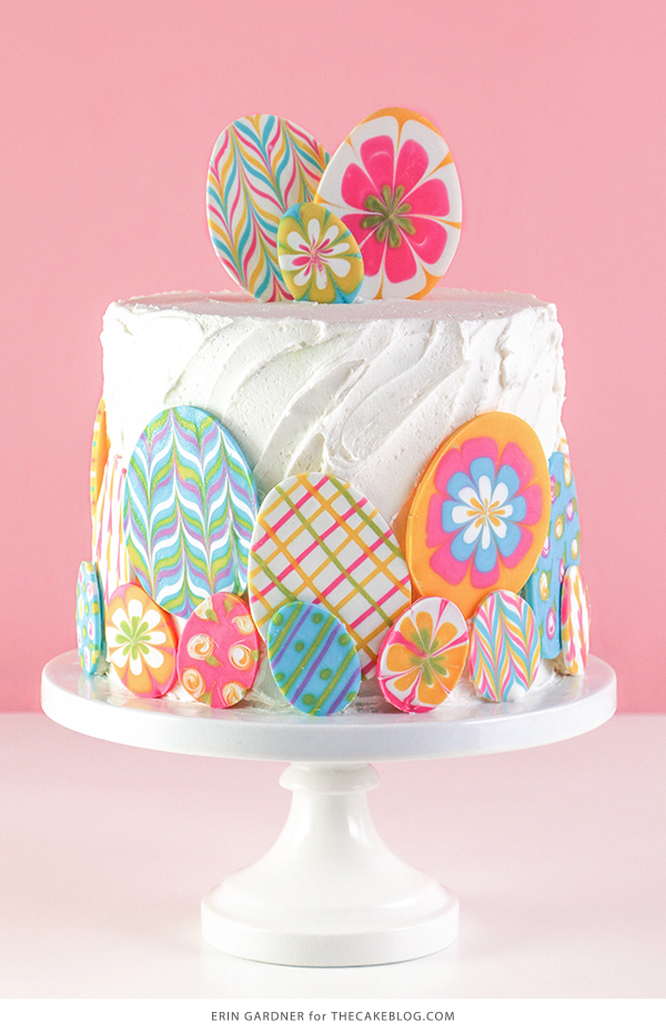 Marbled Chocolate Easter Eggs - how to make marbled Easter egg toppers for cakes and cupcakes using chocolate coating and cookie cutters | by Erin Gardner for TheCakeBlog.com