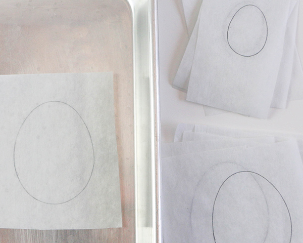 Marbled Chocolate Easter Eggs - how to make marbled Easter egg toppers for cakes and cupcakes using chocolate coating and cookie cutters | by Erin Gardner for TheCakeBlog.com