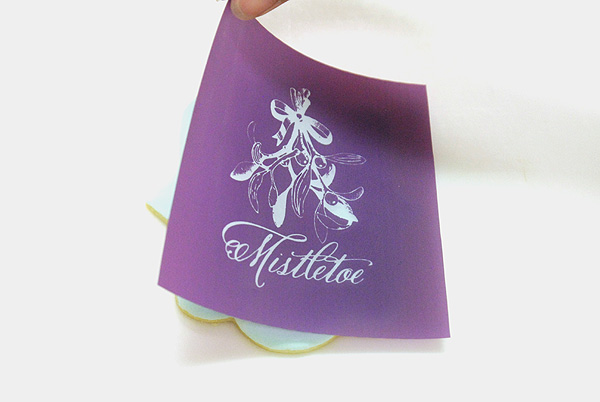 How to stencil-paint a cookie | Mistletoe Cookie Tutorial | by Robin Martin for TheCakeBlog.com