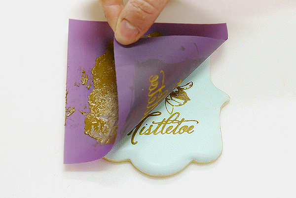 How to stencil-paint a cookie | Mistletoe Cookie Tutorial | by Robin Martin for TheCakeBlog.com