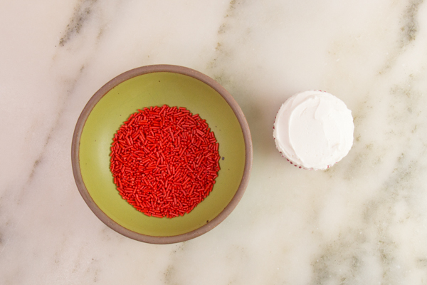 Penguin Cake - a sprinkle coated penguin cake too adorable for words | by Erin Gardner for TheCakeBlog.com