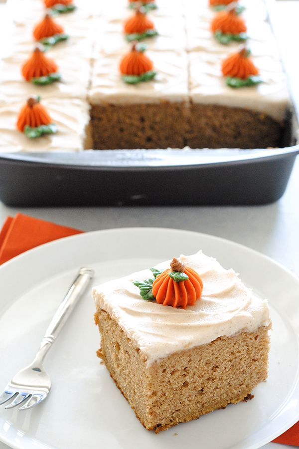 Pumpkin Sheet Cake - easy pumpkin cake with cinnamon cream cheese frosting, made from scratch and perfect for a crowd | by Carrie Sellman for TheCakeBlog.com