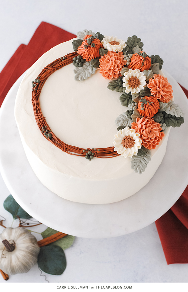 Pumpkin Spice Cake - moist pumpkin cake with cinnamon, ginger and nutmeg paired with pumpkin spice buttercream frosting | by Carrie Sellman for TheCakeBlog.com