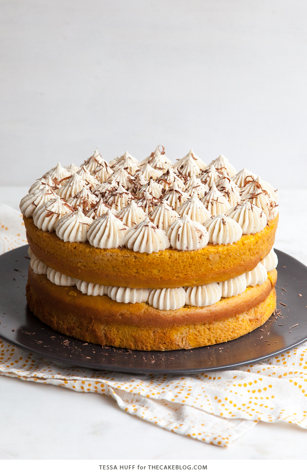 Pumpkin Tiramisu Cake - pumpkin spice cake soaked with coffee liqueur, fluffy mascarpone frosting and chocolate shavings | Tessa Huff for TheCakeBlog.com