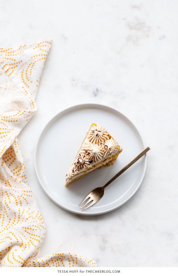 Pumpkin Tiramisu Cake - pumpkin spice cake soaked with coffee liqueur, fluffy mascarpone frosting and chocolate shavings | Tessa Huff for TheCakeBlog.com