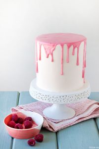 fresh raspberries and a blood orange glaze | Raspberry & Blood Orange Cake| Recipe by Tessa Huff for TheCakeBlog.com