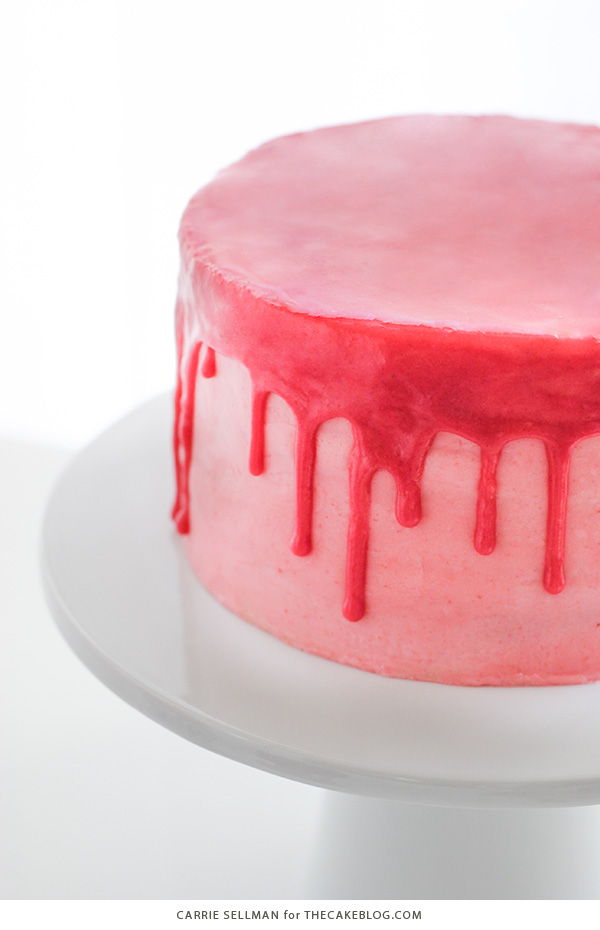 Raspberry Champagne Cake with raspberry drip glaze and fresh raspberries | by Carrie Sellman for TheCakeBlog.com